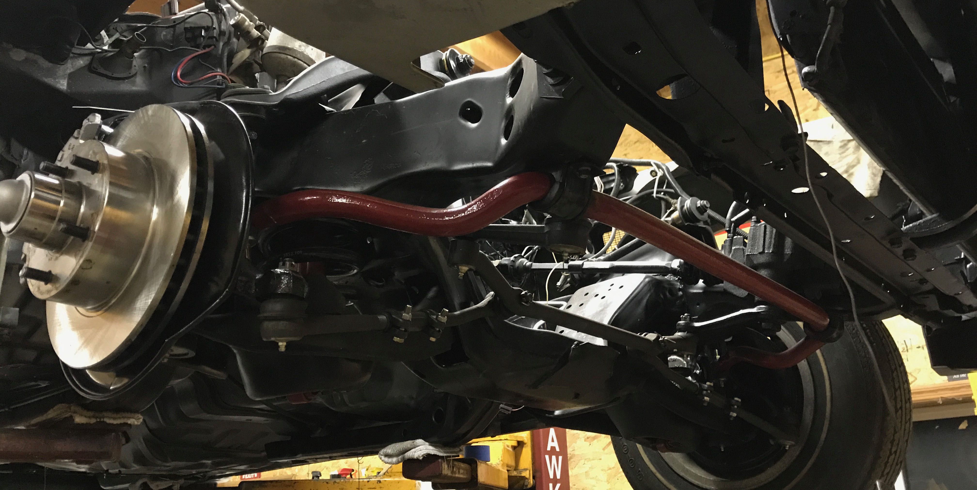 Custom brake installation on classic muscle car